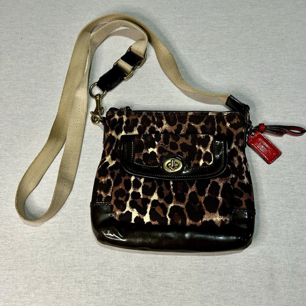 Coach Vintage Ocelot Swingpack crossbody bag with a leopard print exterior
